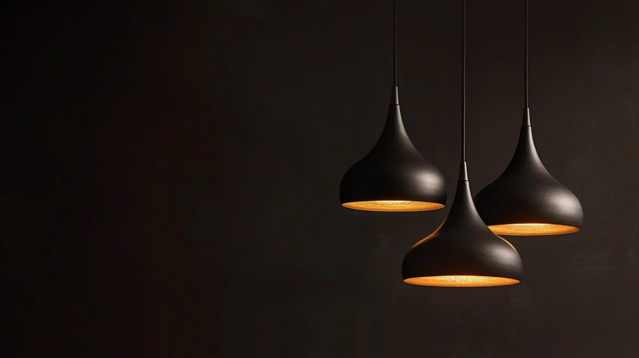 Architectural pendant lighting in a refined contemporary interior